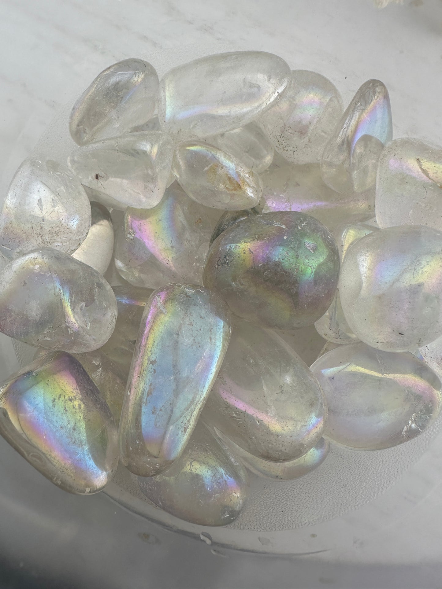 Aura clear quartz tumbles